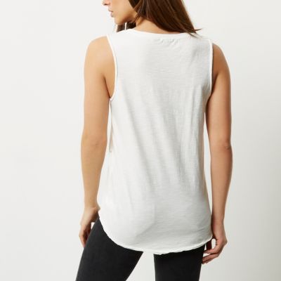 Cream distressed tank top with cut out detail